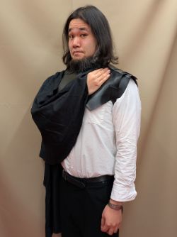 怪しい男